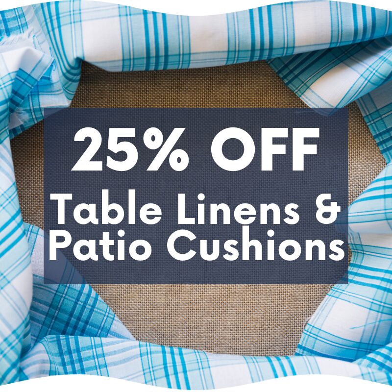 A sign reads "25% OFF Table Linens & Patio Cushions" with blue plaid fabric surrounding a central message box.