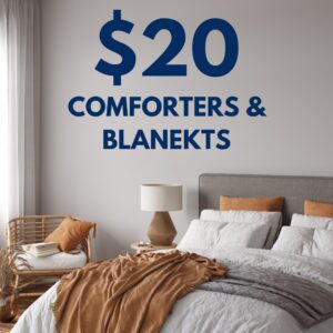 A bedroom with neatly made bed and neutral decor. Large text on wall reads: "$20 Comforters & Blankets.