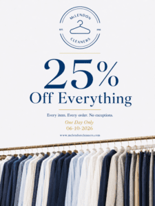 A clothing rack with assorted garments below a promotional sign for McLendon Cleaners offering 25% off everything on June 10, 2026.